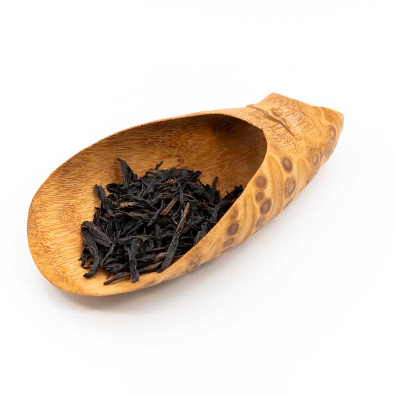 Eight Immortals Phoenix Oolong in a scoop