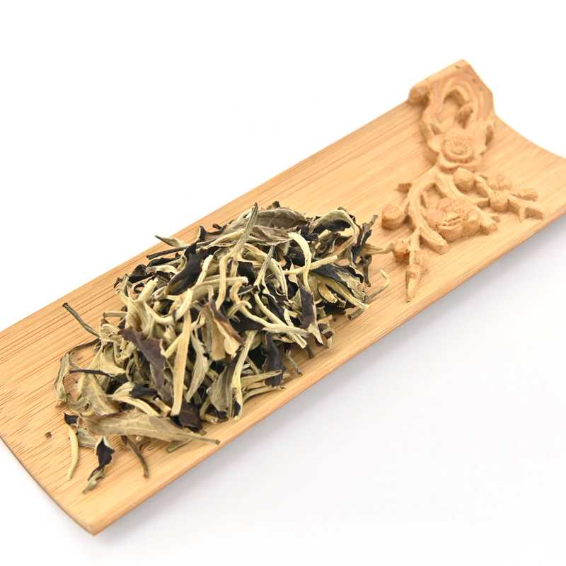 Moonlight White Tea in a scoop