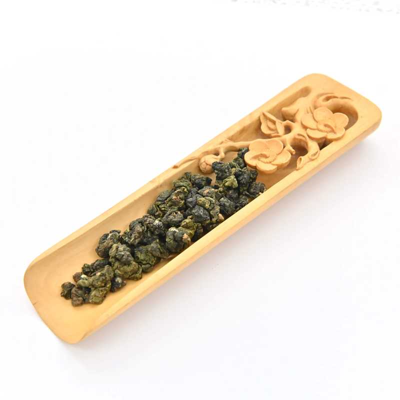 Jin Xuan Milk Oolong in a scoop